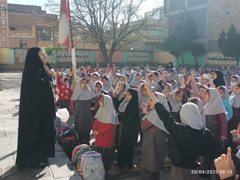 1288672-1 گرامیداشت "شهید هاشمی" در دبستان شهید موسوی