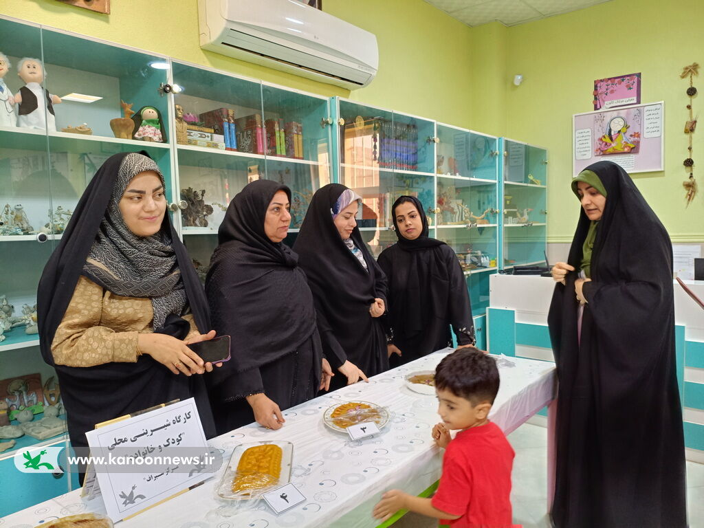 1375309 کارگاه شیرینیهای محلی کودک و مادر در مرکز سیراف