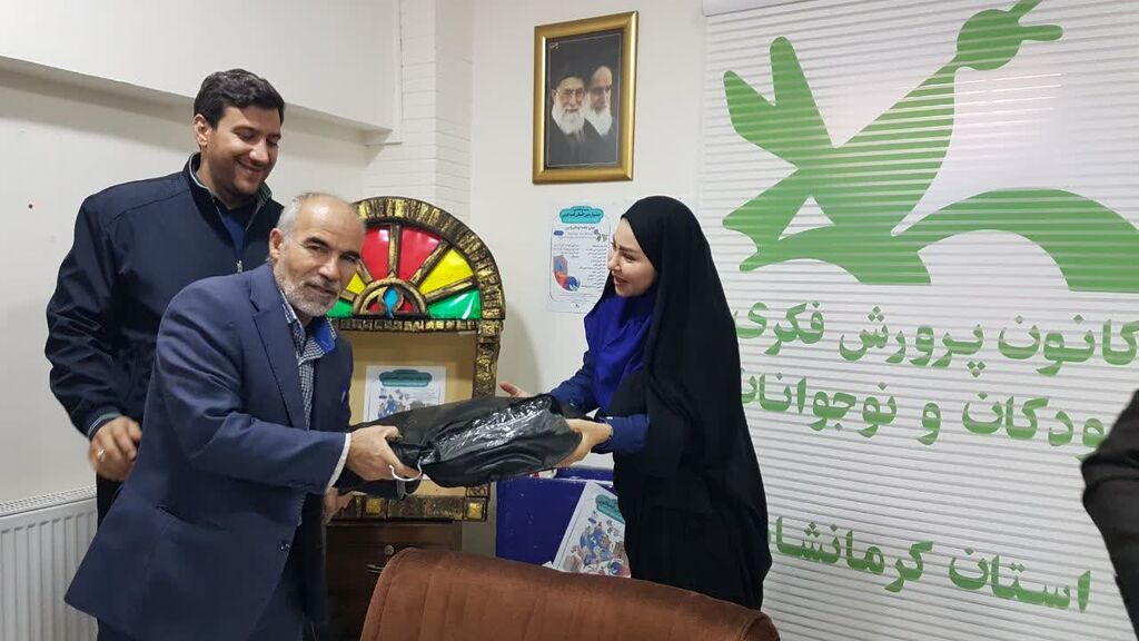 تقدیم بسته‌های پوششی کارکنان حفاظت فیزیکی کانون کرمانشاه