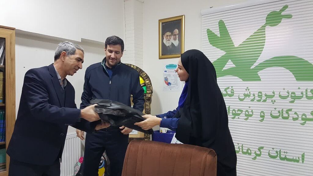 تقدیم بسته‌های پوششی کارکنان حفاظت فیزیکی کانون کرمانشاه